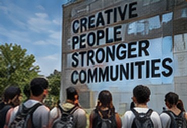 Youth outside a building reading Creative People Stronger Communities, 2020